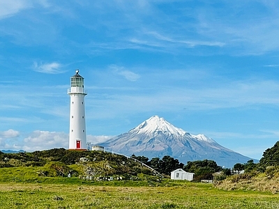 现代风景 雪草原灯塔风光 顶塔楼坡草地 蓝天白云天空 树林森林植被谷 野外自然风光